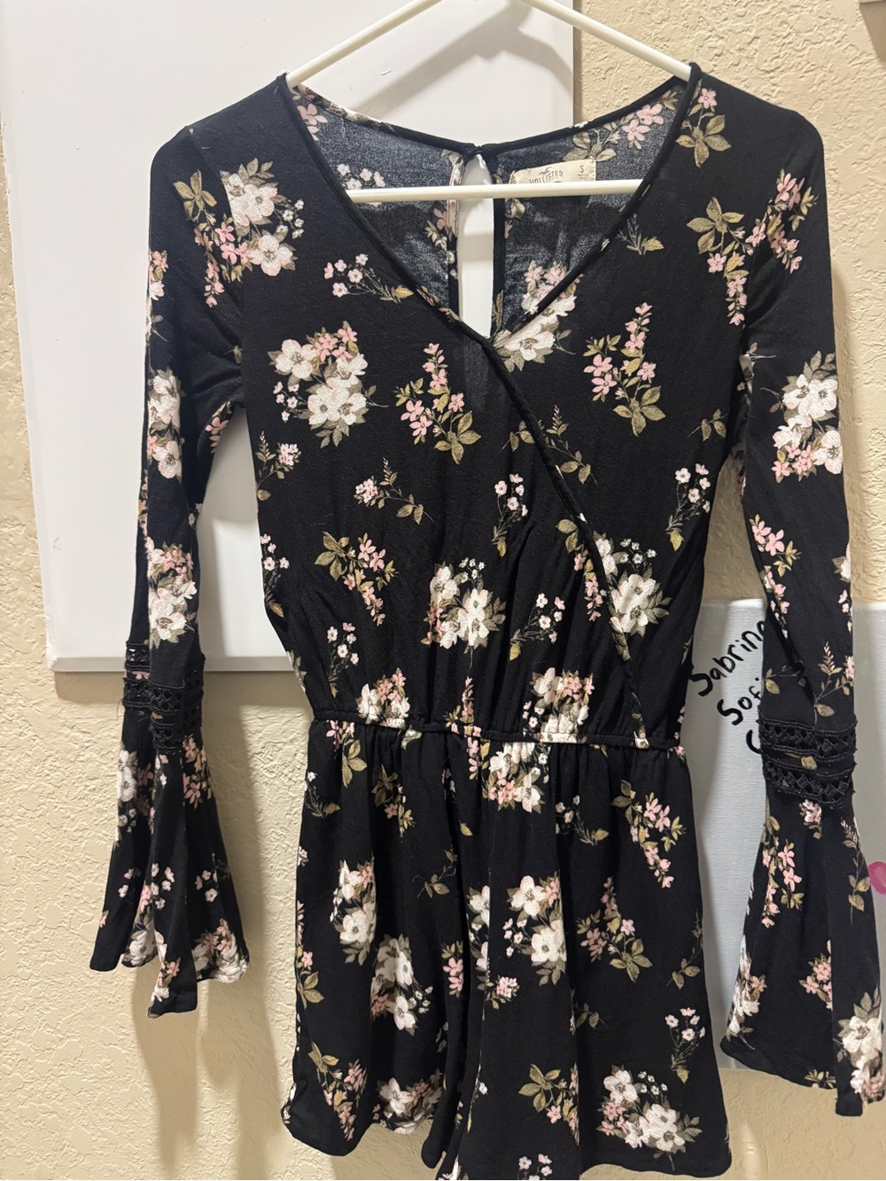 Hollister Black Floral Wrap Romper with Bell Sleeves